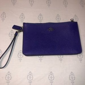 Purple coach clutch
